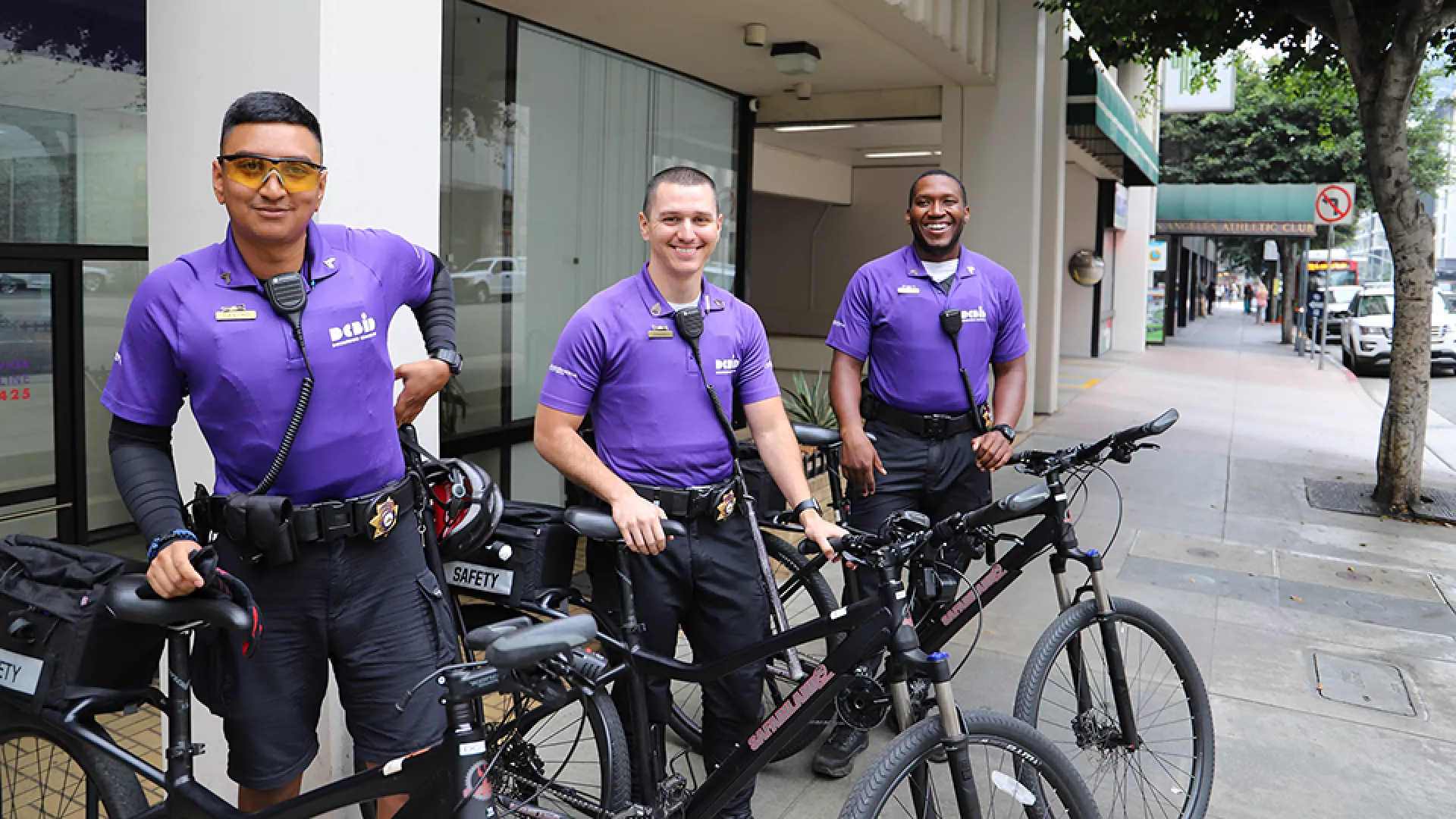 Photo of private three security patrols standing next to their bicycles in Los Angeles
